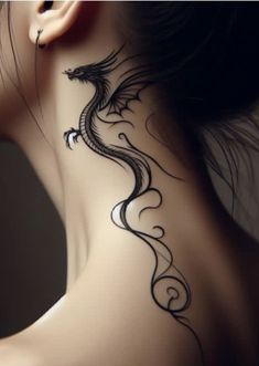 a woman's neck with a dragon tattoo on the back of her neck and behind her ear