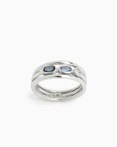 The Triple Band and Stone Ring is a stunning style designed as a tribute to the three U.S. Virgin Islands. Each band and stone represents one of the three islands; St. John, St. Thomas, and St. Croix. Featuring a London blue topaz, Hampton blue topaz, and white zircon, each set in a different shape. Wear this ring alone or stack with others to make a statement. Metal: Sterling silver Stones: London blue topaz, Hampton blue topaz, white zircon Band Width: 5mm Rectangle Stone Size: 6mm x 4mm Oval Hook Bracelet, Stunning Style, St Croix, Shape Wear, St Thomas, Virgin Islands, Oval Stone, Blue Gemstones, London Blue Topaz