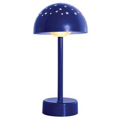 a blue table lamp with stars on the top and a white light in the middle