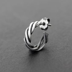 ✈️Free DHL express shipping to USA, EU countries & Canada - 2 days delivery!Totally handmade hoop earring for men - made of braided 925 sterling silver. Available in 3 different sizes and 4 color tones.  Please use drop down menus to choose yours.🛒 Price is for one earring.✔ Requires one standard ear piercing.📏Earring diameter: Small: 13mmMedium: 15mmLarge: 17mm⚖ Earring weight: Small: 1.6grMedium: 1.8grLarge: 2grTheir base metal is 925 solid sterling silver which is plated so they don't t Affordable Small Hoop Earrings For Men, Small Hoop Earring Men, Cheap Minimalist Men's Hoop Earrings, Mens Earrings Hoop Silver, Steel Hoop Earrings For Men, Black Earrings Men, Mens Earrings Studs, Mens Designer Jewelry, Handmade Hoop Earrings