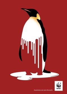 a penguin is standing on the ground with dripping paint