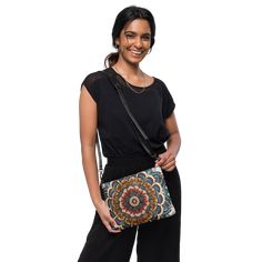 Stylish Mandal Pattern Crossbody Bag Looking for a stylish and functional crossbody bag? Look no further than our versatile crossbody bag, featuring a unique mandal pattern and made of premium faux leather. The bag measures 11″ × 8″ × 1.5″ and is designed with a zip-top closure and multiple inside pockets to keep your essentials secure and organized. But what sets this bag apart is its removable wrist and shoulder straps, allowing you to transform it for day-to-night looks. The dark gray hardwar Pattern Crossbody Bag, Chic Crossbody Bag, Eco Friendly Accessories, Eco Friendly Bags, Eco Chic, Night Looks, Elevate Your Style, Zip Top, Leather Crossbody Bag