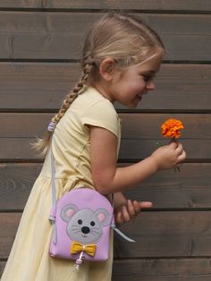 Our cross-body bag for girls up to 6-7 years is carefully handcrafted from an experienced craftswomen in Riga, Latvia. The material used is Italian full grain leather which is soft and very durable. The bag has a pretty animal design and offers space for a wallet, toy or accessories. It is an original and individual gift for your little girl. *Made from premium quality Italian full grain calfskin leather. *Leather with pebbled surface is easy to care for and very durable. *Size 16cmx14cmx3cm. *A Cute Leather Travel Bag, Cute Rectangular Leather Bag, Cute Everyday Crossbody Phone Bag, Cute Leather Rectangular Shoulder Bag, Cute Rectangular Leather Shoulder Bag, Cute Pink Leather Bag, Cute Leather School Shoulder Bag, Cute Leather Shoulder Bag For School, Cute Leather Satchel Shoulder Bag