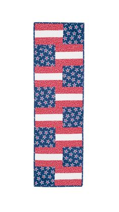 a red, white and blue american flag patchwork towel with stars on it's side