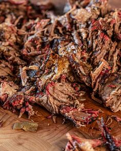 the meat is cut up and ready to be eaten on the cutting board for consumption