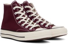 High-top 12 oz cotton canvas sneakers in burgundy. Faux-leather logo patch at inner side. · Round rubber cap toe · Lace-up closure · Eyelets at inner side · Padded Ortholite™ footbed · Treaded rubber sole · Contrast stitching in white Supplier color: Dark beetroot/Egret/Black Casual Burgundy High-top Sneakers, Brown Cotton High-top Sneakers, Maroon Chuck 70, Burgundy High Top Converse, Converse Maroon, Converse Bordo, Red Converse Chuck 70, Red Chucks, Vintage Sneakers