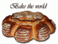 a loaf of bread with the words bake the world in it's center