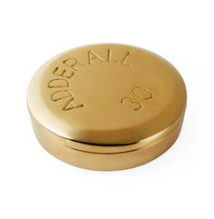 a gold metal container with the word ideal on it