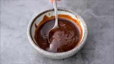 a person is stirring chocolate into a bowl