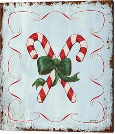 a painting of two candy canes on a blue background