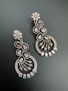 This Dangle & Drop Earrings item is sold by Merake. Ships from Hackettstown, NJ. Listed on Apr 11, 2023 Dazzling Bridal Earrings With Intricate Design, Elegant Intricate Design Earrings For Diwali, Elegant Intricate Earrings For Diwali, Elegant Stone Work Bridal Earrings For Reception, Elegant Chandbali Bridal Earrings With Cubic Zirconia, Elegant Chandbalis With Latkans, Elegant Chandbali Danglers For Reception, Elegant Earrings With Intricate Design For Diwali, Elegant Bridal Earrings With Stone Work For Reception