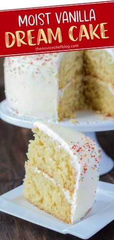 a vanilla cake with white frosting and sprinkles on the top is cut in half