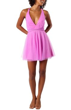 Frothy tulle adds to the party-ready vibes of this strappy minidress designed with a deeply dipped neckline. Hidden back-zip closure Spaghetti straps Deep V-neck Lined 100% polyester Hand wash, dry flat Imported Tulle Mini Dress For Homecoming, Summer Halter Neck Tulle Dress, Summer Tulle Dress With Halter Neck, Summer Backless Tulle Dress, Backless Tulle Mini Dress For Party, Spring Mini Dress With Tulle And Spaghetti Straps, Tulle Mini Dress For Prom Season Night Out, Tulle Mini Dress For Night Out And Prom Season, Pink Mini Length Tulle Mini Dress