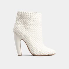 Bottega Veneta "Lido" woven lambskin leather ankle boots 4.00 in / 100 mm stiletto heel Pointed toe Rubber-injected leather outsole. Made in Italy Luxury Heels With Woven Leather And Round Toe, Luxury High Heels In Woven Leather, Luxury High Heels With Woven Leather, Evening Heels With Intrecciato Weave, Luxury White Heeled Boots, Luxury Intrecciato Weave Heels For Formal Occasions, Luxury Intrecciato Weave High Heels, Intrecciato Weave High Heels For Evening, Elegant High Heels With Intrecciato Weave