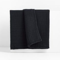 two black towels folded on top of each other