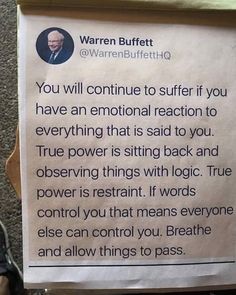 a sign posted on the side of a wall stating that you will continue to suffer if you have an emotional reaction to everything