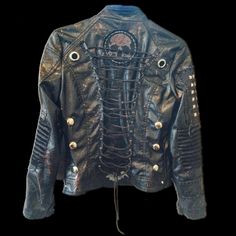 Alternative Studded Leather Jacket For Biker Events, Edgy Studded Leather Jacket For Biker, Gothic Leather Jacket With Studs For Alternative Fashion, Edgy Studded Leather Jacket For Biker Events, Rock Style Leather Jacket With Rivets, Rocker Biker Jacket For Fall Alternative Fashion, Rock Style Leather Jacket With Rivets For Alternative Fashion, Gothic Studded Biker Jacket For Biker Events, Gothic Studded Biker Jacket For Events