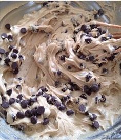 a bowl filled with ice cream and chocolate chips