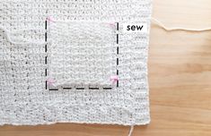 a crochet square with the stitches marked out