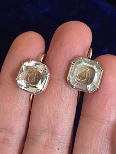 This is a stunning pair of Stuart Crystal earrings from my personal collection circa 1700.  They are in remarkable antique condition for their age.  They have been highly polished by the previous owner so there is no 300+ year patina any longer.  The silver shines like they were made yesterday and this really accentuates the brightness of the crystals. I had purchased these earrings from an antique jewelry store in London.  The pair caught my attention because I had never seen a "B" inside a Stu Victorian Hallmarked Earrings For Ceremonial Occasions, Antique Earrings With 17 Jewels For Ceremonial Occasions, Victorian Rose Cut Diamond Earrings For Formal Occasions, Victorian Style Hallmarked Earrings For Formal Occasions, Formal Victorian Hallmarked Earrings, Victorian Screw Back Earrings For Formal Occasions, Antique Round Earrings With Rose Cut Diamonds, Vintage White Gold Earrings With Rose Cut Diamonds, Antique Rose Cut Diamond Earrings