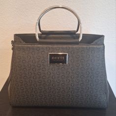 Guess Handbag - Silver Hardware - Can Be Used As Crossbody But Doesn't Come With Strap - Never Used - Light Scratching On Guess Plate Bags Guess, Guess Handbag, Guess Purse, Guess Purses, Janet Guzman, Guess Handbags, Guess Bags, Silver Hardware, Black Gray