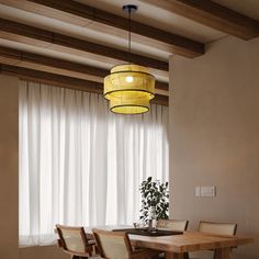 a dining room table with chairs and a chandelier hanging from the ceiling