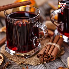 two mugs of mulled with cinnamon and anise