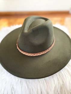 This wide brim hat is the epitome of a classic, versatile style hat. The flexible and stiff flat brim is made from suede braided leather, while the inner drawstring ensures you get that ideal fit. Wide brim hat Structured Suede braided leather band Flat and stiff brim Adjustable inner drawstring Brim 4" Olive Green Hat, Desert Sun, Brown Hats, Green Hats, Wide Brimmed Hats, Brim Hat, Braided Leather, Versatile Style, Wide Brimmed