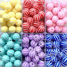 six different colors of striped balls in boxes