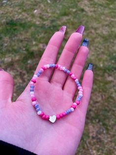 Handmade  Valentines Heart Pink Purple and White Seed mix Beaded Stacking Bracelet, Stretchy Bracelet Friendship Heart Bracelet With Tiny Beads, Heart-shaped Friendship Bracelet With Tiny Beads, Purple Heart Beaded Bracelets, Heart-shaped Letter Beads Bracelet, Purple Heart Beaded Bracelet For Valentine's Day, Cute Heart-shaped Beaded Friendship Bracelets, Cute Beaded Heart Bracelet For Friendship, Cute Beaded Heart Bracelets, Friendship Beaded Bracelets With Heart Charm