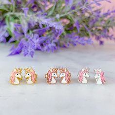 Unicorn stud earrings | Toddler rose gold earrings | Girl gold stud earrings | Gift for little girls | Christmas gift for toddlers. These unicorn stud earrings make a perfect gift for any occasion for a little girl. Metal : 925 Sterling Silver. ( 925 stamped ) Weight : 0,50g. Measurements : 6mm x 8mm. Material : Enamel. These delicate stud earrings are handcrafted from 925 sterling silver, that doesn't tarnish their little ears, hypoallergenic and nickel free. All our items are ship in a organza Silver Hypoallergenic Kawaii Earrings, Hypoallergenic Silver Kawaii Earrings, White Unicorn Print Jewelry For Gifts, White Unicorn Print Jewelry For Gift, Earrings Kids, Children Jewelry, Toddler Christmas Gifts, Beautiful Unicorn, Candy Jewelry