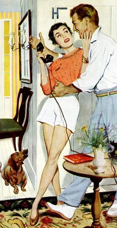 a man holding a woman in his lap while she talks on the phone with her dog