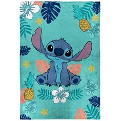 a blue towel with an image of stitch and pineapples on it