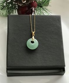 **An Elegant Jade Necklace: Jade is a stone that brings good luck, friendship, peace, and harmony** ** Jade Gemstones** **18 inches chain ** ** Stainless Steel** A FRIENDLY REMINDER FOR OUR RETURN, REFUND & EXCHANGE POLICY   Please read our return, refund, exchange policy before buying. * We don't accept return & refund if the items is on Sale. * We don't accept return & refund if the item is already use or wear. Please note that most chain sometimes change colour due to perspiration, fragrance, Cheap Green Necklace As A Gift, Jade Aesthetic, Jade Necklace Pendant, Jade Charm, Donut Shape, Jade Gemstone, Jade Necklace, Jade Jewelry, Stone Bracelet