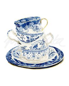 three blue and white teacups sitting on top of each other