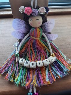 a colorful fairy doll with name spelled on it