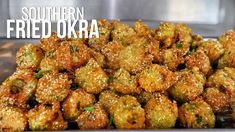 fried okra is piled on top of each other with the words southern fried okra above it