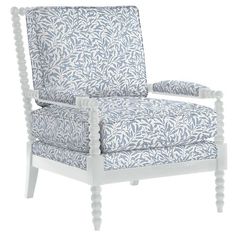 a blue and white chair with buttons on the arm rests against a white background,