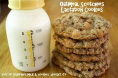 a stack of cookies next to a bottle of milk with the words oatmeal sc