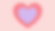 a blurry image of a blue heart on a pink background with red and white highlights