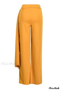 Olivia Mark - Womens High-Waisted Straight Solid Color Pant in Yellow with Stylish Asymmetrical Folded Patchwork Accent Chic Asymmetrical Hem Bottoms For Work, Asymmetrical Workwear Bottoms For Spring, Chic Pants With Asymmetrical Hem, Chic Asymmetrical Hem Pants, Asymmetrical Solid Bottoms For Work, Asymmetrical Solid Bottoms For Workwear, Asymmetrical Bottoms For Workwear In Fall, Asymmetrical Hem Pants For Fall Workwear, Versatile Workwear Bottoms With Asymmetrical Hem