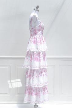 A uniquely feminine maxi, the La Vie En Rose dress features a lovely china pattern-inspired floral print in pink, structured boning the bodice, a tiered, full-length skirt, adjustable shoulder straps, a center-back zipper, and a gathered bustier-style neckline. Please Note, this item is final-sale only. . Details: S: Bust 32"-34", Waist 28" M: Bust 34"-36", Waist 30" L: Bust 36"-38", Waist 32" Length from Shoulder: 55" Skirt Length Waist to Hem: 43" No Stretch, Please Check Measurements Material Neckline Details, Rose Maxi Dress, French Girl Style, Full Length Skirts, Rose Dress, French Girl, Blouse And Skirt, Sweater Skirt, Rose Pink