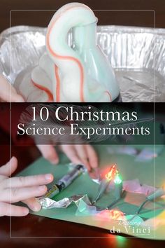 children are making christmas science experiments with tin foil and lights on the table in front of them