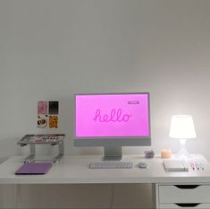 a desktop computer sitting on top of a white desk