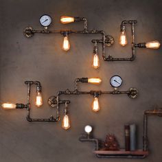 industrial pipe light fixtures are arranged on the wall