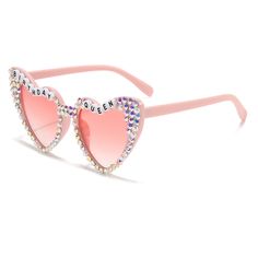 a pair of pink sunglasses with hearts and words on the front, both decorated with crystals