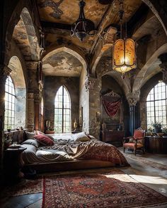 an ornate bedroom with stone walls and arched windows is pictured in this image from the inside