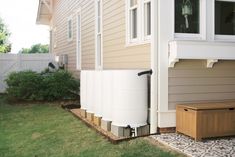 an outside view of a house with a water heater