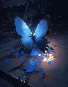 a large blue butterfly sitting on top of a wooden floor covered in blue flowers and petals