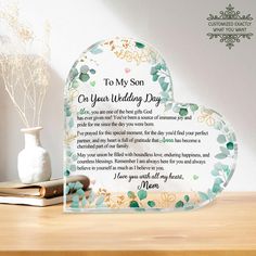 a heart shaped plaque with the poem to my son on your wedding day